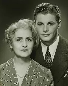 Pearl Collection: Mother and adult son, formal portrait, in studio, (B&W), portrait