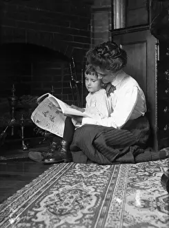 Motherhood Prints: Mother and Child Reading by Fireplace