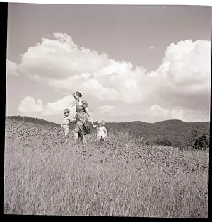 Mother and Children in Field