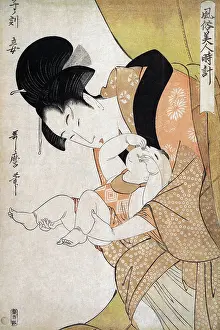 Motherhood Prints: Mother craeses a sleeping infant