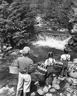 Button Down Shirt Prints: Mother and daughters, carrying picnic baskets, looking at waterfall