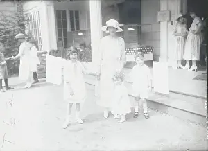 Mother Holding Hands with Her Children