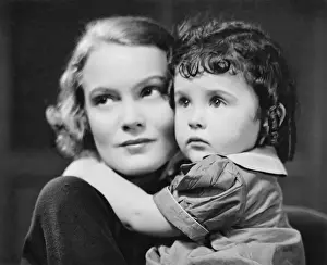 Daydreaming Prints: Mother holding young girl (3-4), (B&W), close-up, portrait