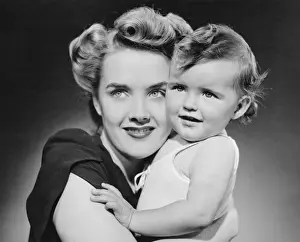 12 17 Months Prints: Mother hugging baby girl (12-18 months), (B&W), close-up