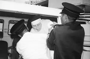 Ambulance Prints: Mother Superior Winfred Duff Being Assisted from Ambulance