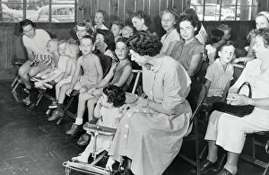 Mothers and Relatives with Children Gathered for Polio Vaccine