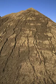 Mound of sand in a commercial sandpit after a heavy rainfall, Quebec, Canada