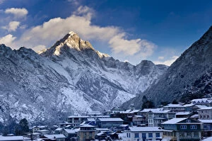 Mountain overlooking snowy village