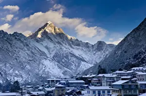 Cultural Image Prints: Mountain overlooking snowy village
