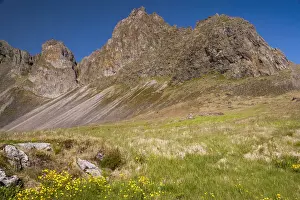 Mountain peaks rising high above coast, North Iceland, Iceland