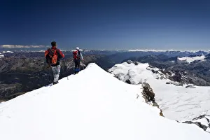 Images Dated 11th August 2011: Mountaineer on the summit ridge, descent from Mt Piz Palue, Grisons, Switzerland, Europe