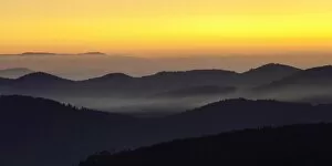 Mountains in evening light, view from Feldberg mountain to the Rhine Valley, atmospheric inversion, Black Forest