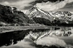 Alpine Prints: Mountains reflecting in remote lake, Key Summit, Southland, New Zealand