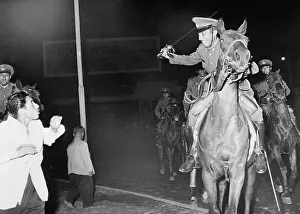 Lima Prints: Mounted Policeman Swings Sword at Rioter