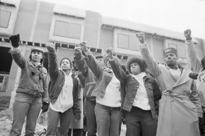 Mourner Prints: Mourners Giving Black Power Salute