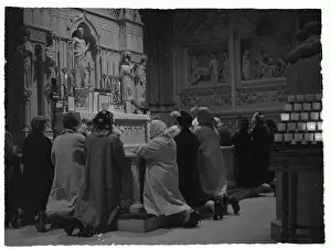 Mourners Praying in Saint Patricks Cathedral