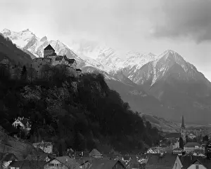 Moutains and Houses Below Them