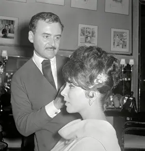 Movie Star Joan Collins Modeling New Hairstyle