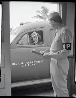 M.P. Checking in Soldier