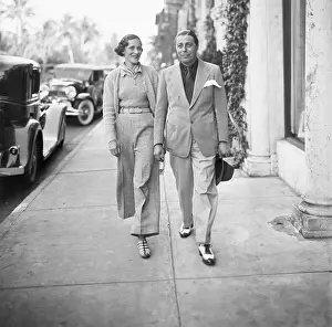 Mr. and Mrs. Adam Gimbel Walking