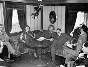 Interview Prints: Mr. and Mrs. Albert Einstein on Ship with Reporters