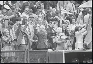 Mr. and Mrs. Charles Finley Cheering with Fans in Stadium