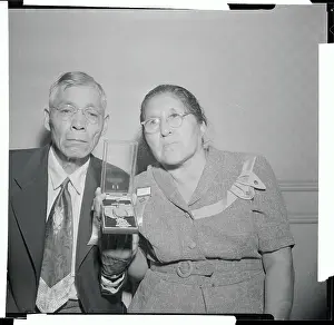 Mr. and Mrs. Jacob George Holding a Congressional Medal of Honor