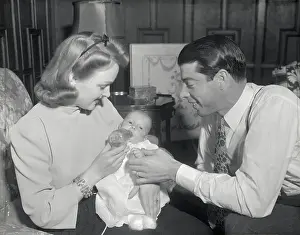 Mr. and Mrs. Joe DiMaggio with Their Infant Son