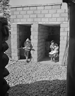 Lexington Prints: Mr. and Mrs. McKinney in Air Raid Shelter with Son