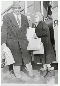 Mr. and Mrs. Paul Robeson Waiting to Board Flight