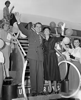 Prints of (Original Caption). Presidential nominee Richard Nixon and Mrs. Nixon are shown as they prepared to board an airliner at National Airport bound for Mrs A Presidency in Pictures: Mr. and Mrs. Richard Nixon Boarding Plane