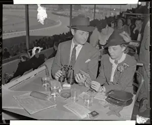 Mr. and Mrs. Robert Montgomery Dining at Race Track