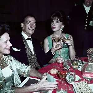Mr. and Mrs. Salvador Dali Sitting at Table with Gina Lollobrigida