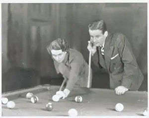 Mr. and Mrs. Thomas Carnegie Jr. Playing Pool