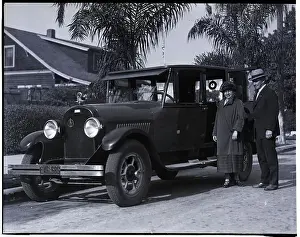 Retiree Prints: Mr. and Mrs. Tommy Ryan Outside Of Car