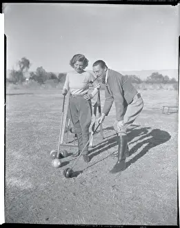 Mr. and Mrs. Warren William Playing New Game