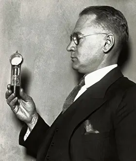 Mr. Zworykin Holding Radio Tube