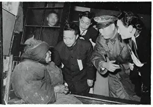 Mrs. Chiang Kai-Shek Speaking to an Old Lady