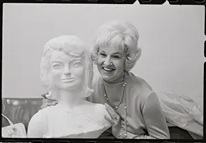 Mrs. Eleanor Root Posing with Bust of Mrs. Kennedy