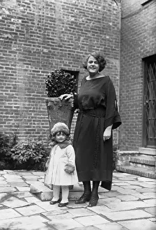 Mrs. Enrico Caruso Posing with Young Daughter Outside Home