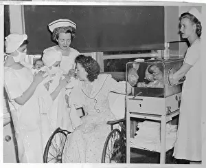 Mrs. Ethel Collins Kissing Her One of Her Sons
