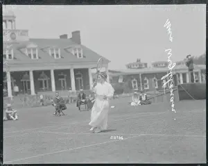 Prints of (Original Caption). Photo taken at the National Woman's Lawn Tennis Championship. Photo shows Mrs. George Wightman A Game of Elegance: Tennis Through the Ages: Mrs. George Wightman Playing Tennis