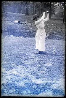 Prints of (Original Caption) 5/25/14-West Orange, New Jersey- Woman's Metropolitan Golf Association Championship Tourney; Mrs. H. Blumenthal. (Photo by © Bettmann/CORBIS/Bettmann Archive) Swing Through History: Mrs. H. Blumenthal Swings Golf Club