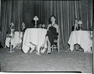 Mrs. Igor Cassini at Table