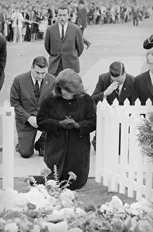 Mrs. Jacqueline Kennedy Kneeling at Her Husband's Grave