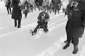 Gstaad Prints: Mrs. John F. Kennedy and John Sledding