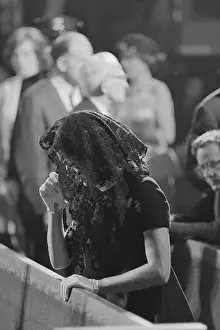 Mrs. John F. Kennedy Shown Praying