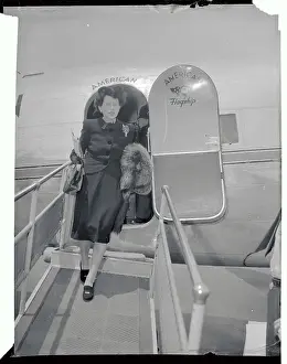 Disembarking Prints: Mrs. Joseph P. Kennedy Getting Out of Plane