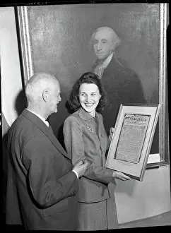 Announcement Prints: Mrs. Malone Holds Framed Broadside