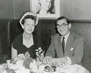 Mrs. and Mrs. Irving Berlin Sitting at Dinner Table